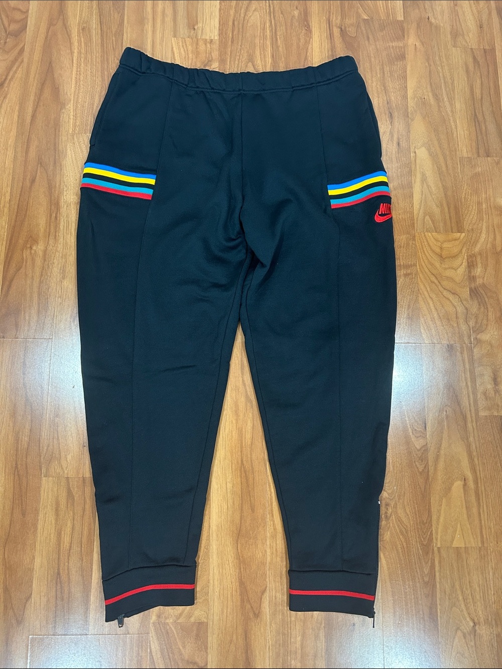 Nike Kids Black Joggers with Rainbow Stripe Accents